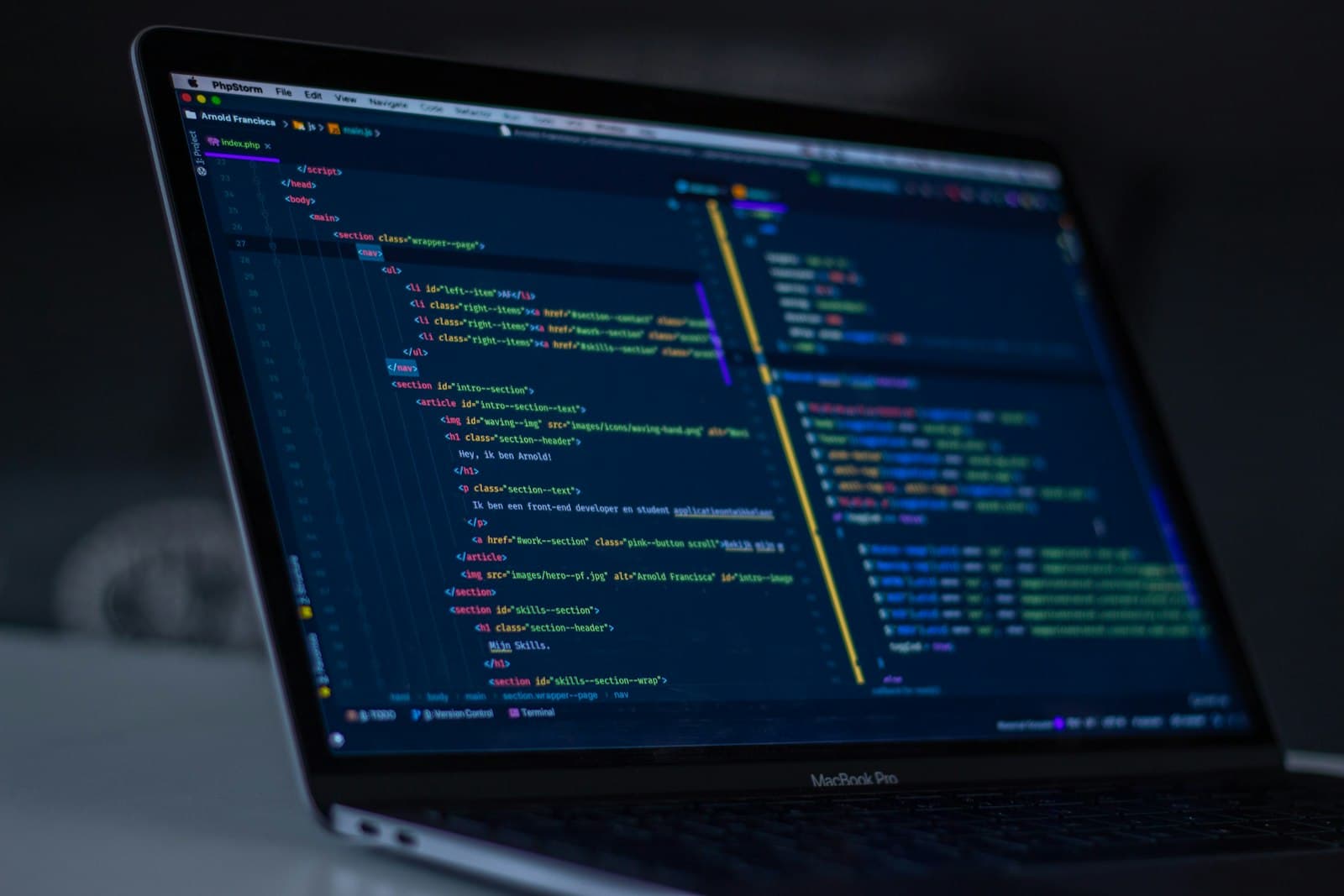 Code on a glowing monitor in a dark room, representing the focus and craft of building production AI agents.