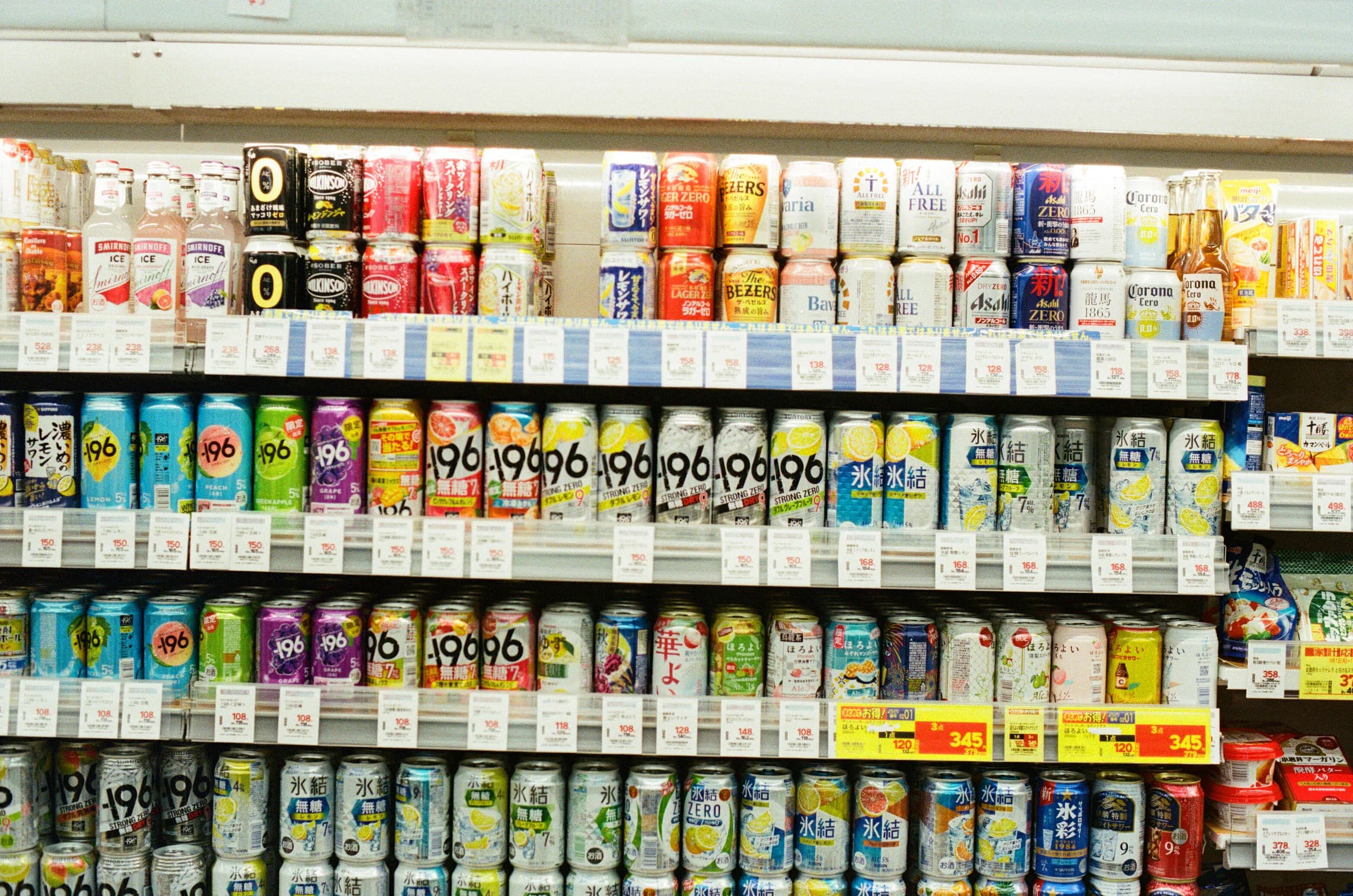 Real beverage and RTD brands merchandised across a retail shelf